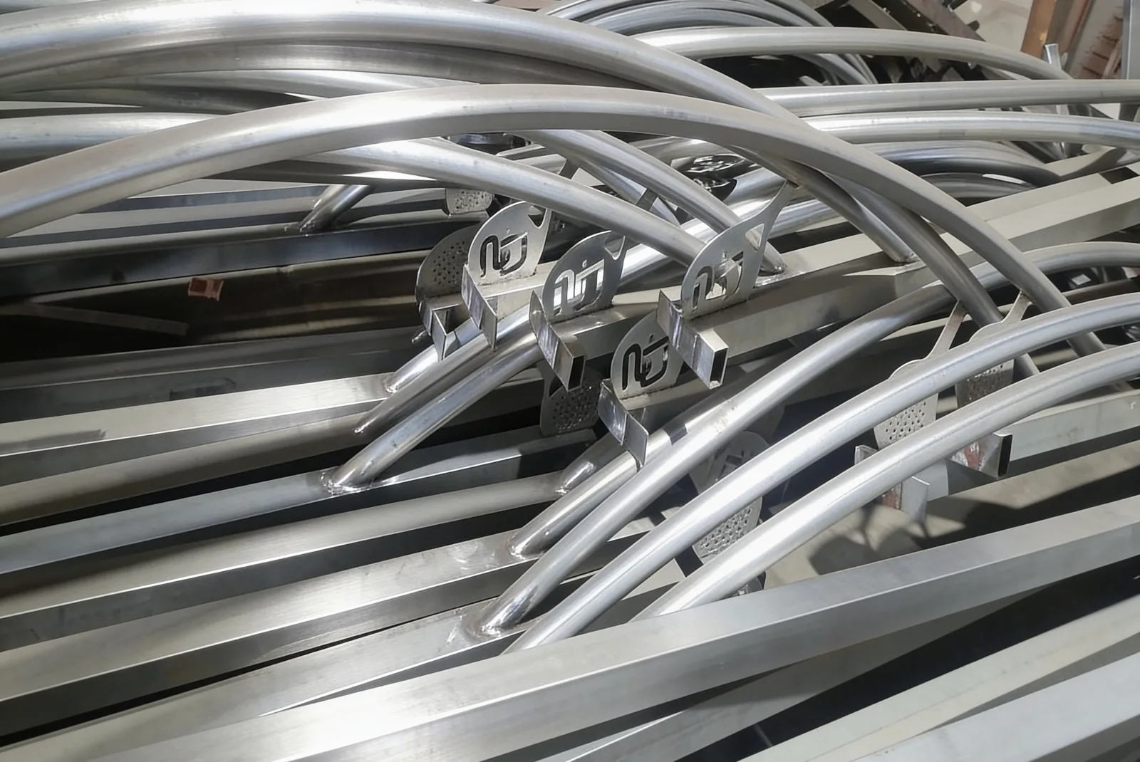 Curved light arms and frames welded in the workshop